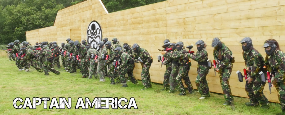 <Large photograph of paintball players>