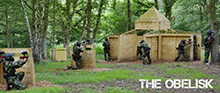 <Photograph of paintball players near Obelisk>